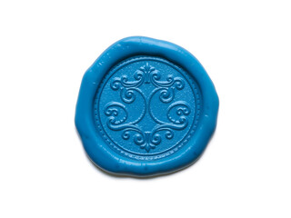 A decorative blue wax seal with intricate embossed detailing, isolated on white. Generative AI