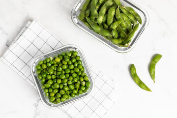 green peas in glass container for storage and cooking, healthy lifestyle, vegetable protein,...
