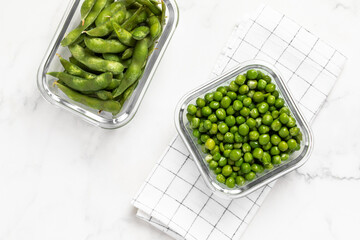 green peas in glass container for storage and cooking, healthy lifestyle, vegetable protein,...