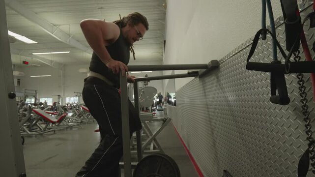 Man doing Dips at the Gym