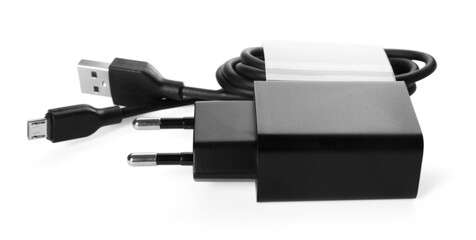 USB power adapter and charge cable isolated on white