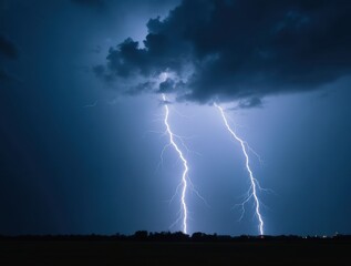 Lightning bolts striking the ground during dramatic thunderstorm