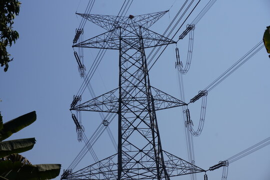 400kV transmission line tower, which is a structure used to support high-voltage power lines against the blue sky