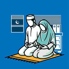 Muslim couple praying together on a prayer mat