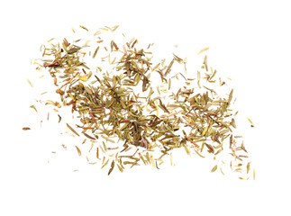 Scattered pile of dry thyme isolated on white background. Dried crushed oregano leaves top view....