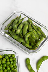 green peas in glass container for storage and cooking, healthy lifestyle, vegetable protein, potassium, fibervvv