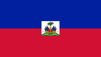National flag of Haiti displayed proudly against a clear blue sky in a vibrant outdoor setting