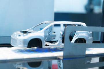 miniature cars assembled in a factory