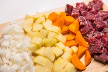 Sliced fresh vegetables and meat for cooking