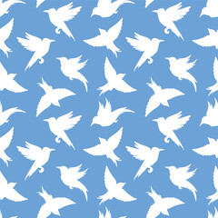 Bird silhouettes seamless pattern. Vector background.