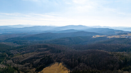 Obraz premium Stunning Aerial View of Austria: Cinematic Drone Footage of the Danube River, Majestic Mountains, Lush Wilderness, and Picturesque Villages, Capturing the Natural Beauty of the Austrian Landscape.