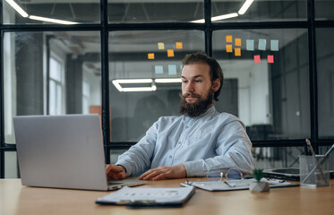 Focused at work. Businessman is in the office