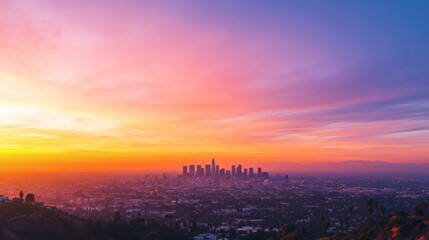 Naklejka premium Vivid colorful sunset paints a city skyline with bright hues