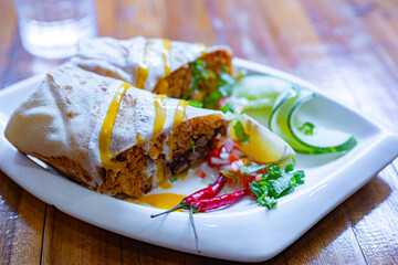 Chicken burrito served in restaurant