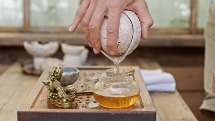 Enjoy the Aromatic Tea Pouring Ritual in a tranquil setting, ideal for relaxation and nature