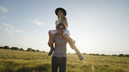 A Joyful Couple is Delightfully Enjoying a Beautiful Sunny Day in the Great Outdoors