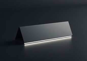 Blank Table Tent Card Isolated on Dark Surface with Soft Lighting