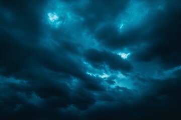 Obraz premium Black green blue night sky with clouds. Dark dramatic skies background for design. Cloudy rainy windy stormy weather.