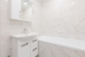 modern bathroom room with toilet and washing machine