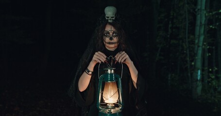 A Mysterious Figure Stands in a Dark Forest Holding a Lantern and a Skull, Surrounded by Shadows