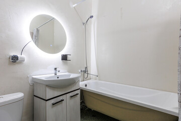 modern bathroom room with toilet and washing machine