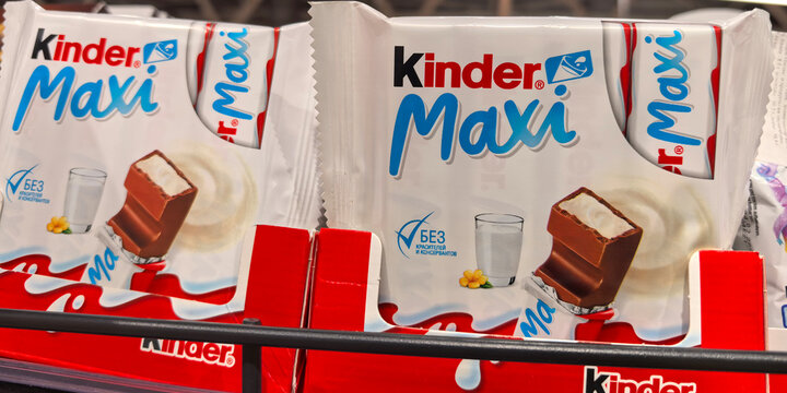 Delightful chocolate treats on display in a store aisle in the afternoon