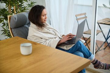 Comfortable Work From Home Setup for Freelance Designer in Cozy Environment