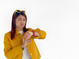 Unhappy face of asian Thai woman wear yellow jacket and sunglasses, worried look at red watch,...