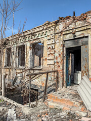 destroyed and burned houses in the city in Ukraine
