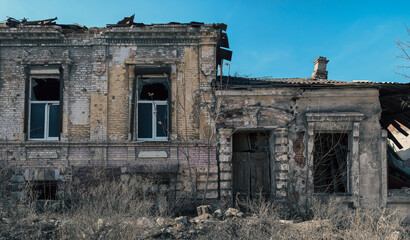 destroyed and burned houses in the city in Ukraine