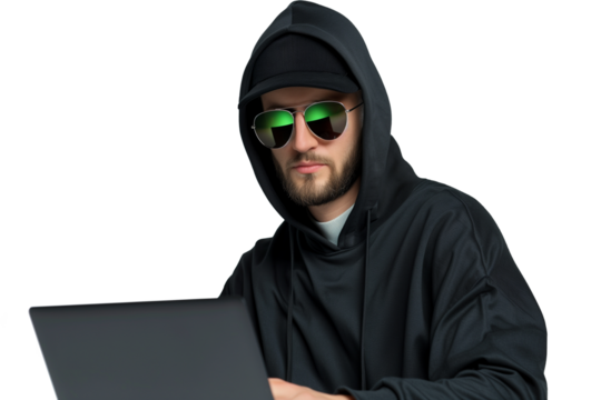 Serious young Ukrainian ethical hacker engaged in cybersecurity work on laptop with sunglasses on a white or transparent background 