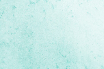 Smooth flat vintage paper bag pale texture in light blue color on table background. Organic soft turquoise plain back craft book concept for simplicity azure teal scrap backdrop, simple top surface