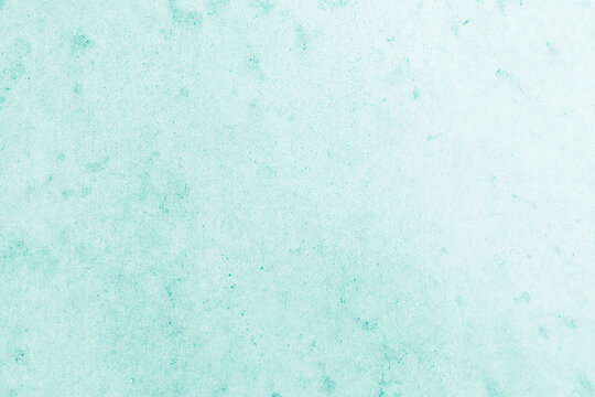 Smooth flat vintage paper bag pale texture in light blue color on table background. Organic soft turquoise plain back craft book concept for simplicity azure teal scrap backdrop, simple top surface