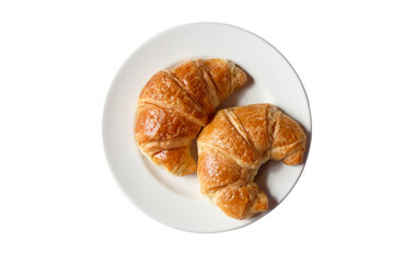 White dish with croissants on white background...