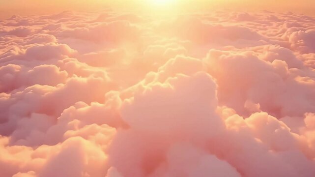 High flight above clouds painted in golden and pink hues by the sun. Tranquility and endless sky expanse.