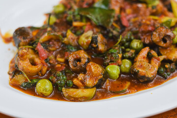 Thai stir-fried spicy eel dish. The herbs and spices used to garnish this dish add flavor.