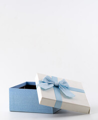 Open blue gift box with ribbon