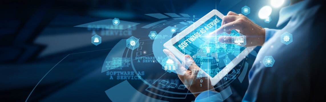 A person is using a digital interface, highlighting Software As A Service (SaaS) as a cloud-based solution that allows users to access applications over the internet without the need for installation.