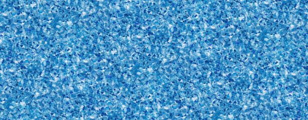 Clear bright blue water fills the swimming pool, with sunlight creating shimmering reflections on the surface, setting a vibrant summer atmosphere perfect for relaxation