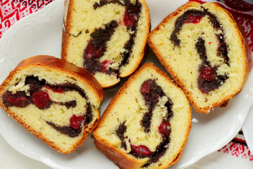 Yeast roll with poppy seeds and cherrie.top veiw