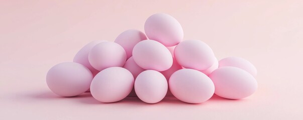 A visually appealing arrangement of pale pink eggs stacked on a soft pink background, creating a serene and minimalist aesthetic.