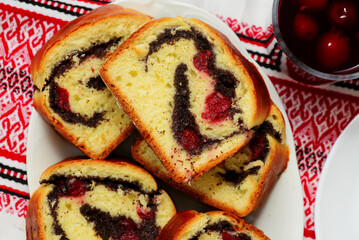 Yeast roll with poppy seeds and cherrie.top veiw