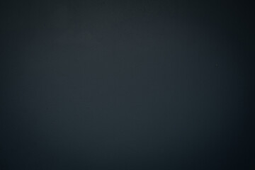 Dark grey textured concrete wall background