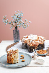 Colomba - Italian traditional Easter bread is topped with pearl sugar and almonds in the shape of a dove. Festive pastries are traditional in Italy.