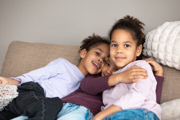 Loving Sibling Embrace &ndash; Happy Childhood Moments