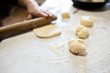 Dough for homemade pies. Yeast dough for pies. Grandma makes pies.