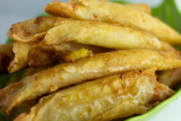 fried roll with caramel banana filling inside