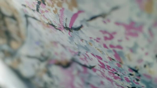 Fabric with beautiful colorful flora patterns flutters in the wind. Closeup. Macro. Slow mo, slow motion, high speed camera, 200fps