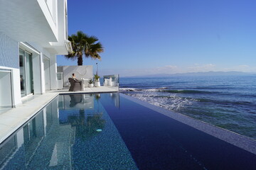 Interiror design details at a luxury beach villa by the Mediterranean Ocean