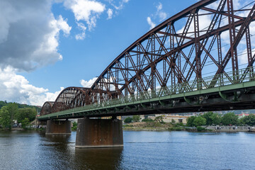Old railway bridge and Vltava river in Prague